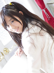 Skinny and flexible Japanese cutie Aiku-chan seduces us with her twintails and tight thong stretching